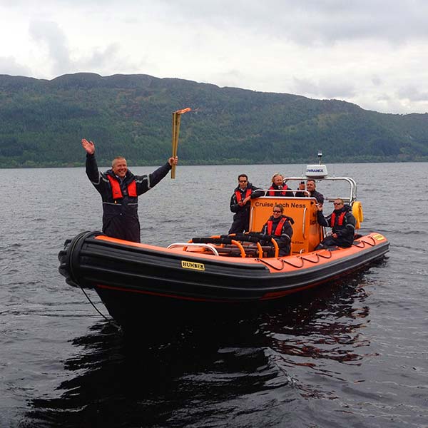 An Olympic Torch aboard one of our RIB boats